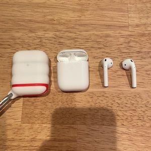 Apple AirPods with silicone case + packaging